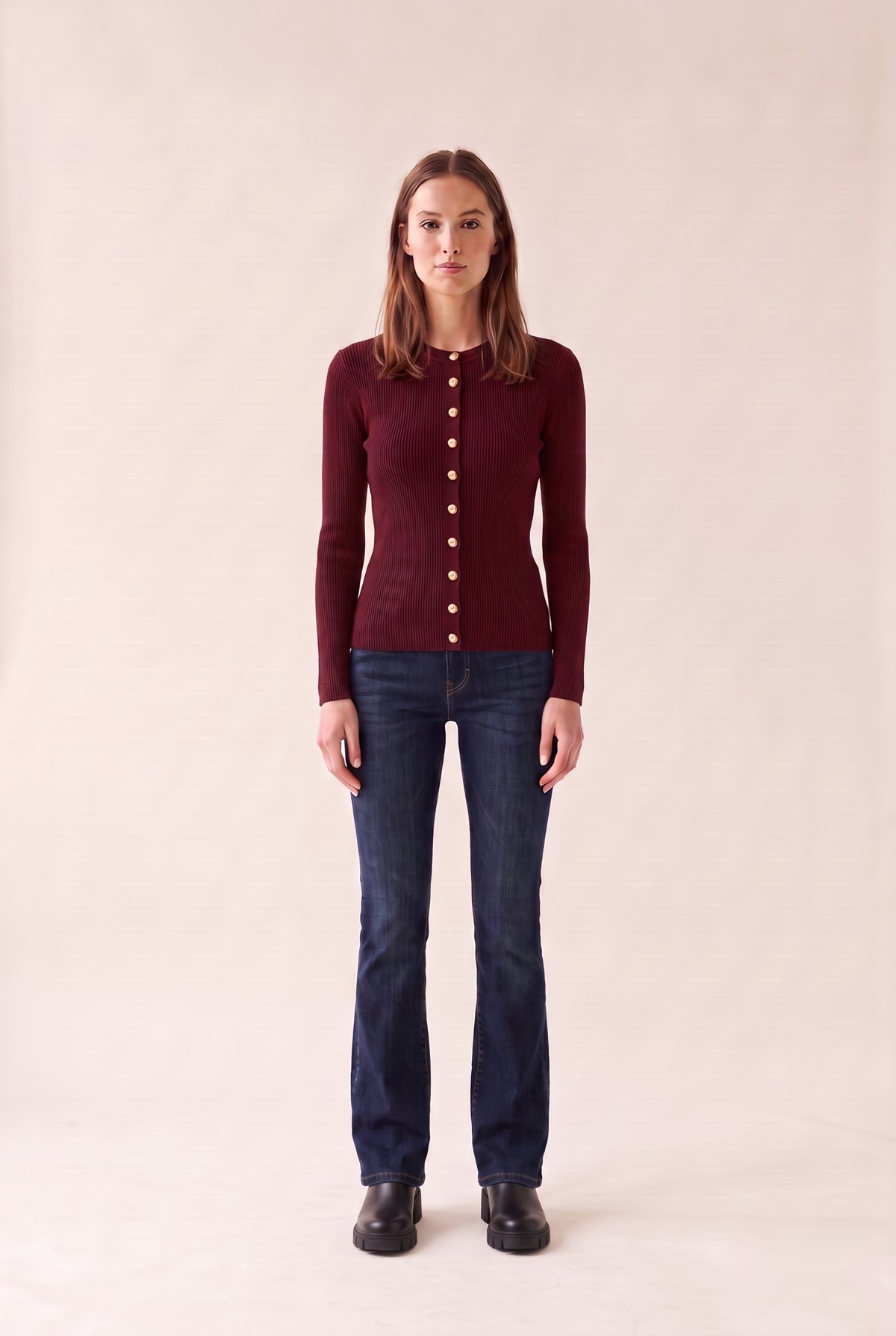 October date outfit, budget look: burgundy ribbed cardigan with gold buttons, dark bootcut jeans and black chelsea ankle boots